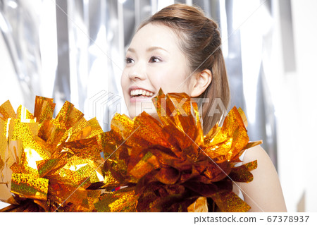 Cheerleader cheering with a smile Cheerleader cheering with a smile 67378937