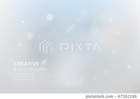 Blur winter sky abstract background with white snowfall bokeh 67382289