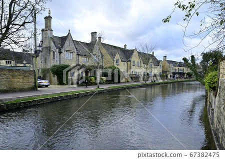 Bourton-on-the-Water, riverside and "stone house" cityscape Bourton-on-the-Water, riverside and "stone house" cityscape 67382475