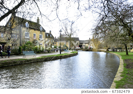 Bourton-on-the-Water, riverside and "stone house" cityscape Bourton-on-the-Water, riverside and "stone house" cityscape 67382479