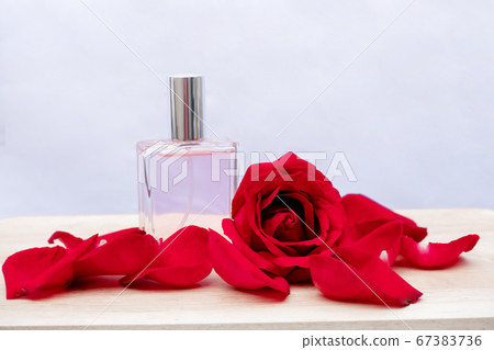 Essential oil in bottles extracted from rose Essential oil in bottles extracted from rose 67383736