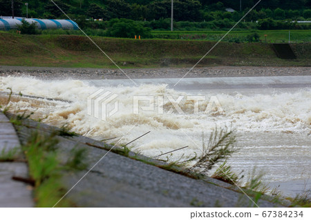 Muddy stream 67384234