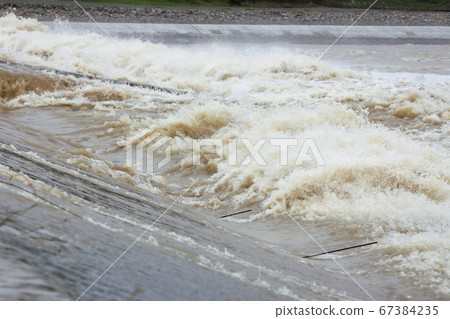 Muddy stream 67384235