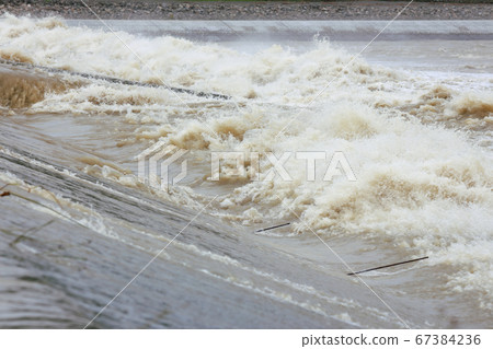Muddy stream 67384236