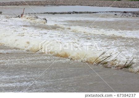 Muddy stream 67384237