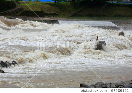 Muddy stream 67386161
