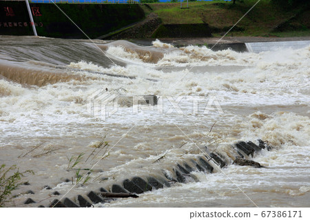 Muddy stream 67386171