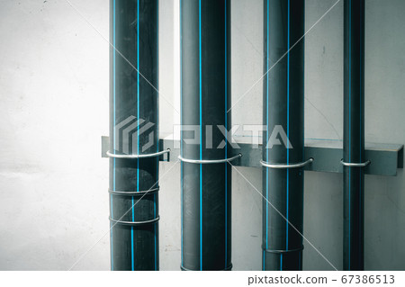 HDPE Pipeline Drainage Installation With Steel Support Pipe Embedded on Wall HDPE Pipeline Drainage Installation With Steel Support Pipe Embedded on Wall 67386513
