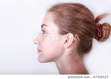 Facial Skin Care and Beauty Face Treatment, Closeup Portrait Headshot of Pretty Woman Face 67386527