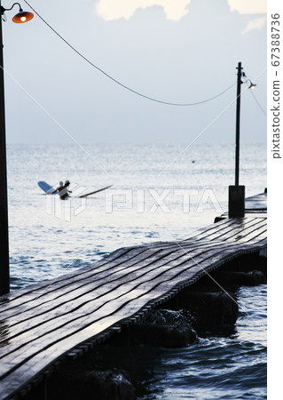 Haraoka coast pier and surfers 67388736