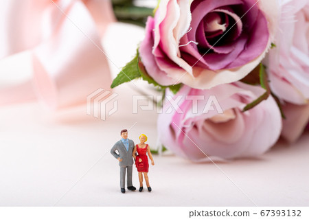 Miniature world concept- Miniature figurine of traveler, businessman, couple, family 146 Miniature world concept- Miniature figurine of traveler, businessman, couple, family 146 67393132