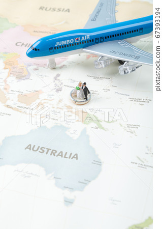 Miniature world concept- Miniature figurine of traveler, businessman, couple, family 068 67393194