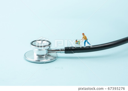 Miniature world concept- Miniature figurine of traveler, businessman, couple, family 221 67393276