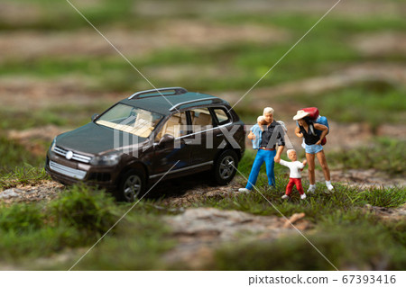 Miniature world concept- Miniature figurine of traveler, businessman, couple, family 025 67393416