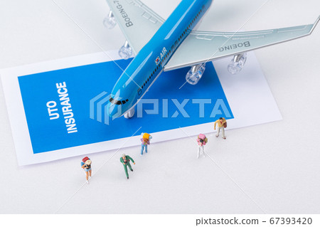 Miniature world concept- Miniature figurine of traveler, businessman, couple, family 032 67393420