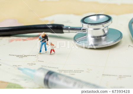 Miniature world concept- Miniature figurine of traveler, businessman, couple, family 005 Miniature world concept- Miniature figurine of traveler, businessman, couple, family 005 67393428