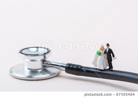 Miniature world concept- Miniature figurine of traveler, businessman, couple, family 147 67393484