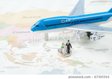 Miniature world concept- Miniature figurine of traveler, businessman, couple, family 101 Miniature world concept- Miniature figurine of traveler, businessman, couple, family 101 67393503