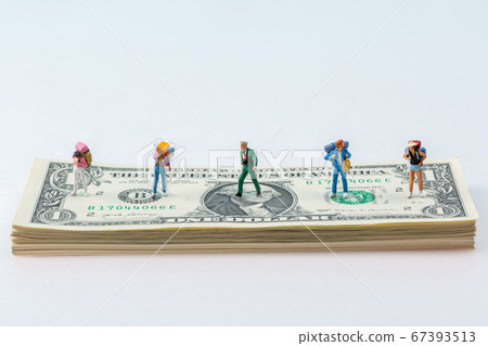 Miniature world concept- Miniature figurine of traveler, businessman, couple, family 063 Miniature world concept- Miniature figurine of traveler, businessman, couple, family 063 67393513