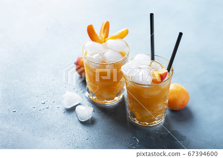 Summer juice with apricots and ice Summer juice with apricots and ice 67394600
