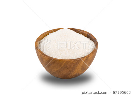 Refined granulated sugar in wooden bowl on white background. Refined granulated sugar in wooden bowl on white background. 67395663