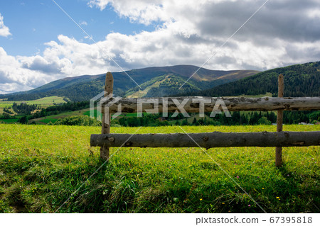 fence on the hill in rural area. early autumn fence on the hill in rural area. early autumn 67395818