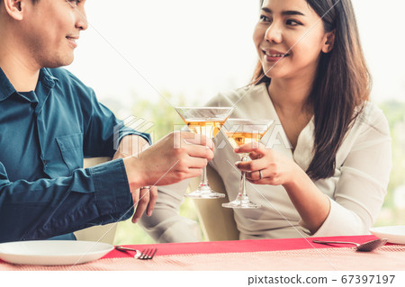 Happy romantic couple eating lunch at restaurant 67397197