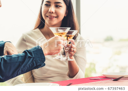 Happy romantic couple eating lunch at restaurant 67397463