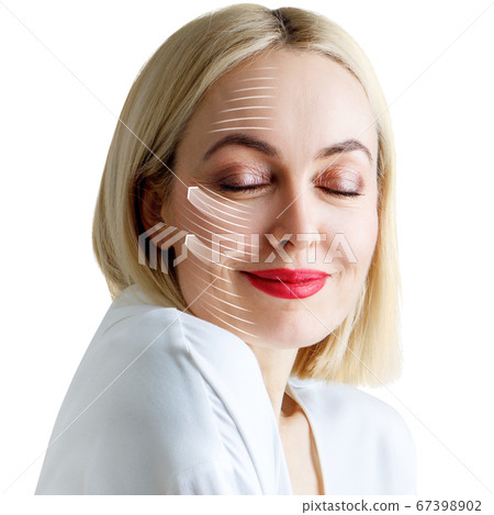 Graphic lines shows facial lifting effect on skin of beautiful woman. Graphic lines shows facial lifting effect on skin of beautiful woman. 67398902
