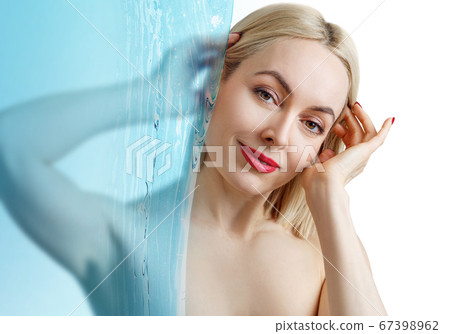 Sensual woman under water splash over white background. Sensual woman under water splash over white background. 67398962