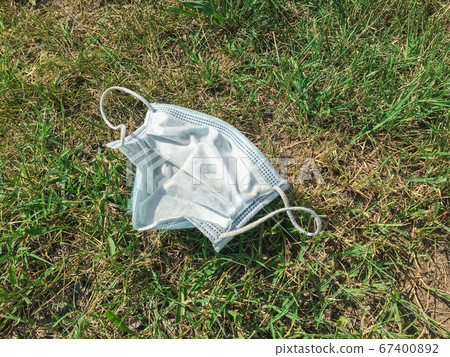 Medical protective mask thrown to the ground Medical protective mask thrown to the ground 67400892