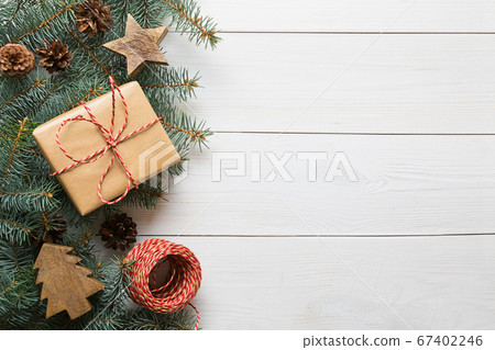 Christmas craft gift, wooden diy, evegreen fir tree on wooden board. Top view.  67402246