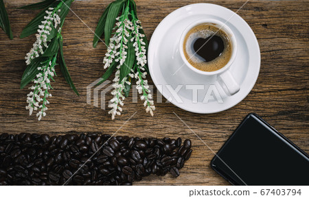 Heart coffee and coffee beans roasted in a sack on Heart coffee and coffee beans roasted in a sack on 67403794