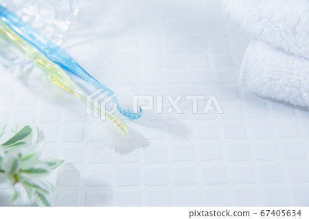 Two toothbrushes and a towel. Tooth care such as brushing teeth, image of daily life. 67405634