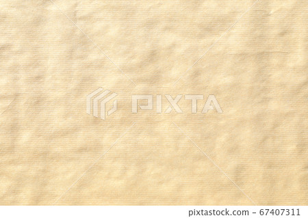 Crumpled brown paper background texture Crumpled brown paper background texture 67407311