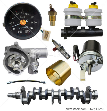 A lot of new auto parts isolated on a white background. Autoshop. 67411256