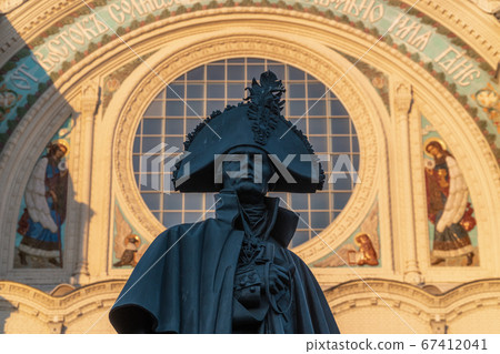 Summer views of the Nikolsky Sea Cathedral and the monument to Admiral Ushakov in the morning at dawn Summer views of the Nikolsky Sea Cathedral and the monument to Admiral Ushakov in the morning at dawn 67412041