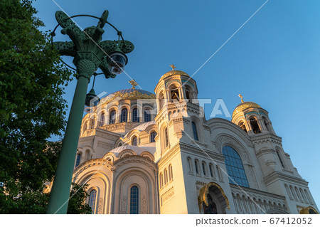 Russia. Kronshtadt. Summer views of St. Nicholas Sea Cathedral in the morning at dawn Russia. Kronshtadt. Summer views of St. Nicholas Sea Cathedral in the morning at dawn 67412052
