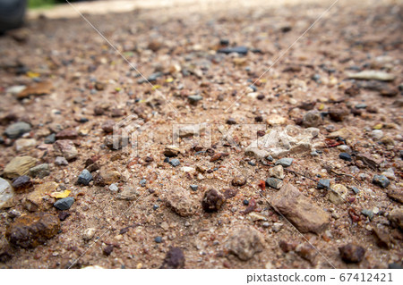 Red cobblestone road surface background Red cobblestone road surface background 67412421