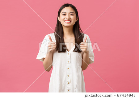 Beauty, people emotions and summer leisure and vacation concept. Supportive girlfriend cheering up, chanting or rooting for you, showing thumbs-up, encourage, recommend best place ever Beauty, people emotions and summer leisure and vacation concept. Supportive girlfriend cheering up, chanting or rooting for you, showing thumbs-up, encourage, recommend best place ever 67414945