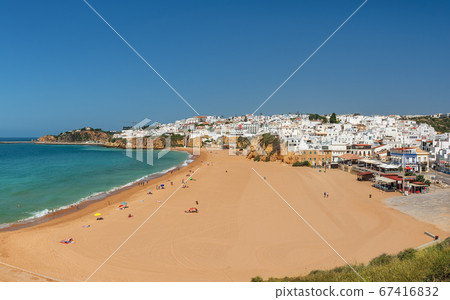 Aerial panorama of Albufeira, Algarve, Portugal. Beautiful view of the sea landscape with the beach, ocean. Aerial panorama of Albufeira, Algarve, Portugal. Beautiful view of the sea landscape with the beach, ocean. 67416832