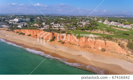 Aerial Golf Park Vale de Lobo, Vilamoura, Portugal. Great place to relax with views of the beach, ocean. 67416842