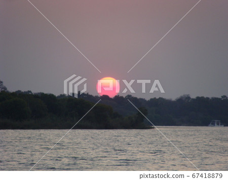 Sunset over the Zambezi River, Africa Sunset over the Zambezi River, Africa 67418879