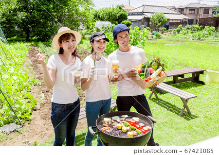 BBQ with fresh vegetables caught in the kitchen garden BBQ with fresh vegetables caught in the kitchen garden 67421085