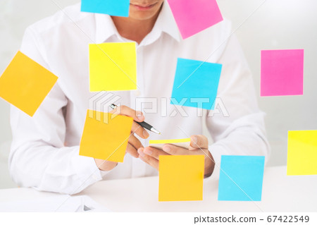 Creative group of business people brainstorming Creative group of business people brainstorming 67422549