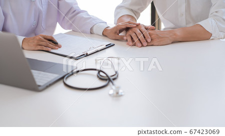 Patient receiving bad news, he is desperate and Patient receiving bad news, he is desperate and 67423069