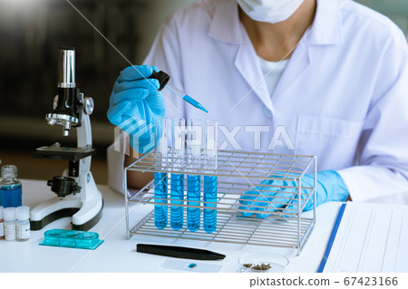 Scientist wear lab coat and protective wear are Scientist wear lab coat and protective wear are 67423166