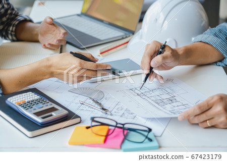 Cooperation Corporate designers in the office are Cooperation Corporate designers in the office are 67423179