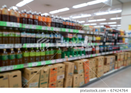 Blur image of beverage department in supermarket 67424764