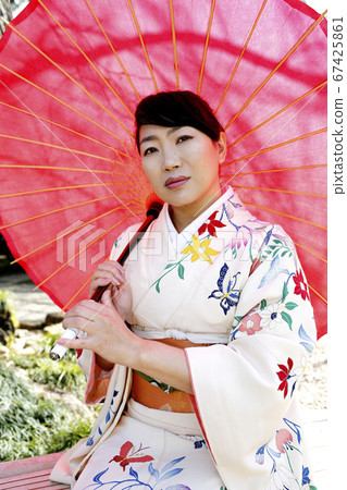 Kimono woman and cherry blossoms 67425861